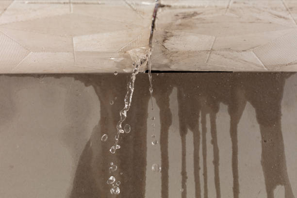 Professional Flood Damage Cleanup technician working in Hudson, ME